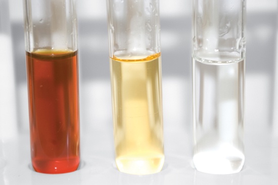 Iodine/oxalate solutions (from left) before exposure to light, after extended exposure to a sun lamp, and after extended exposure to strong sunlight