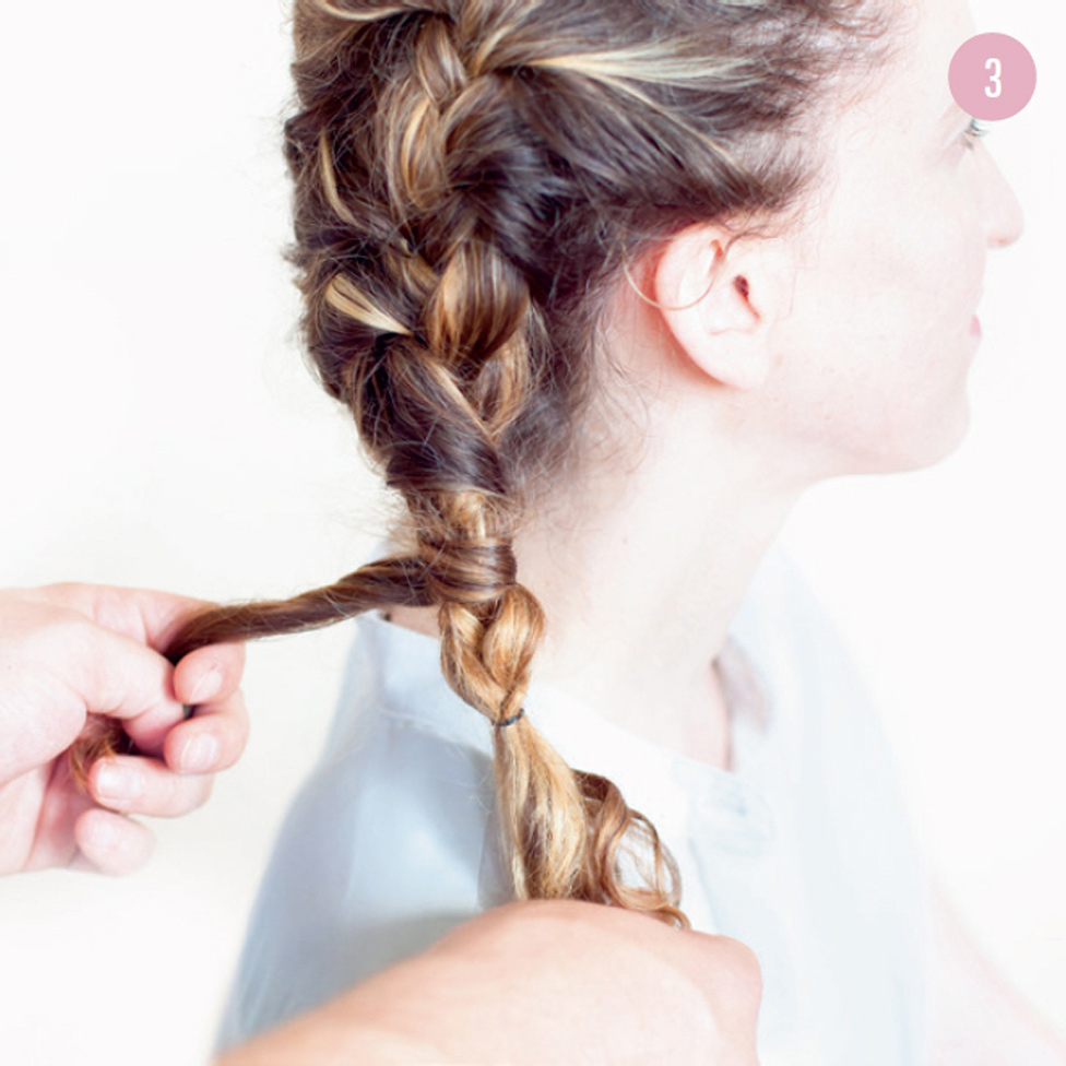 3 Wrap that free section of hair around the braid in a haphazard pattern