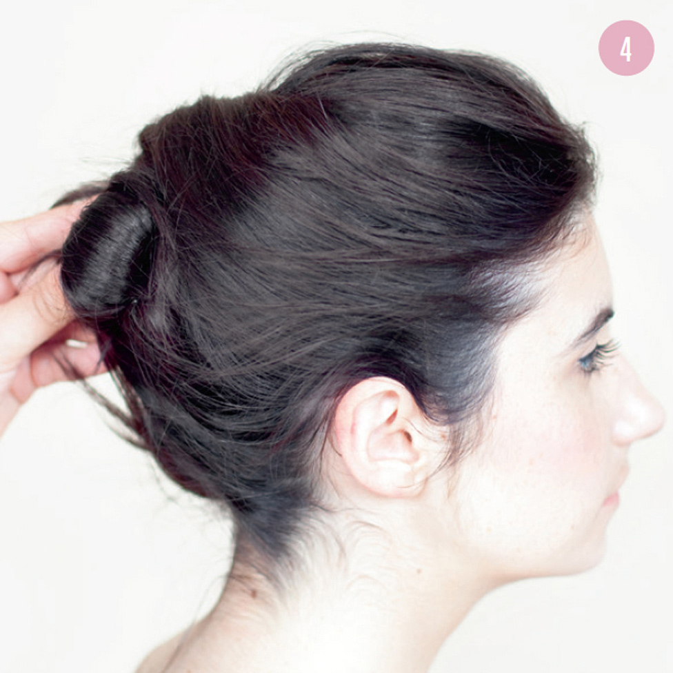 4 Pull up the hair at your neck and combine all the ends of the twirls into a messy bun