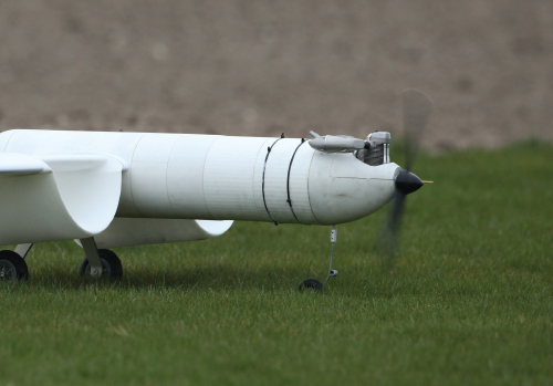 Photo of OS 30 cc GF30 four-stroke engine installed in a hybrid powered UAV.