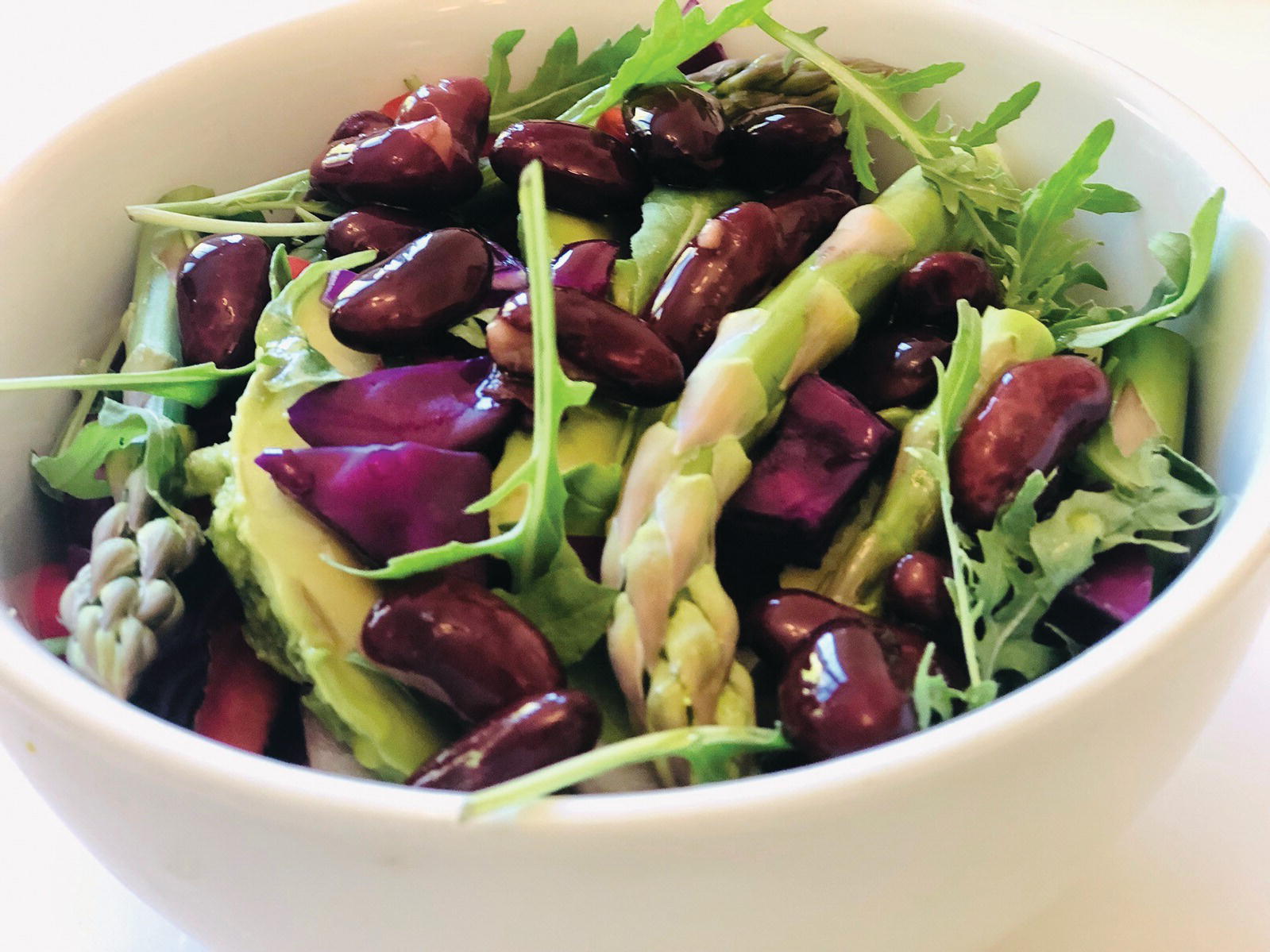 Photo displaying a bowl of rainbow salad.