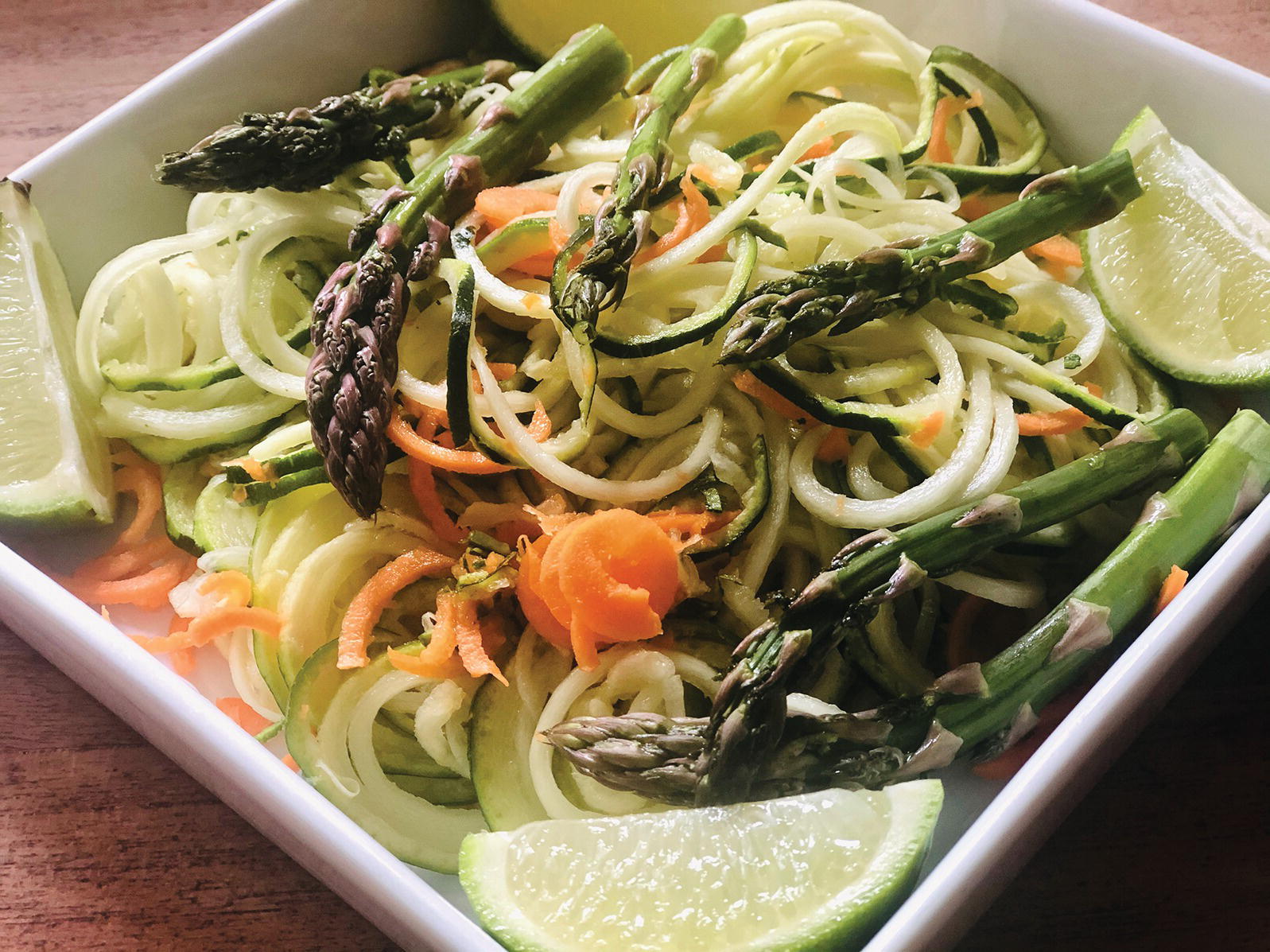 Photo displaying vegetable spaghetti with asparagus.