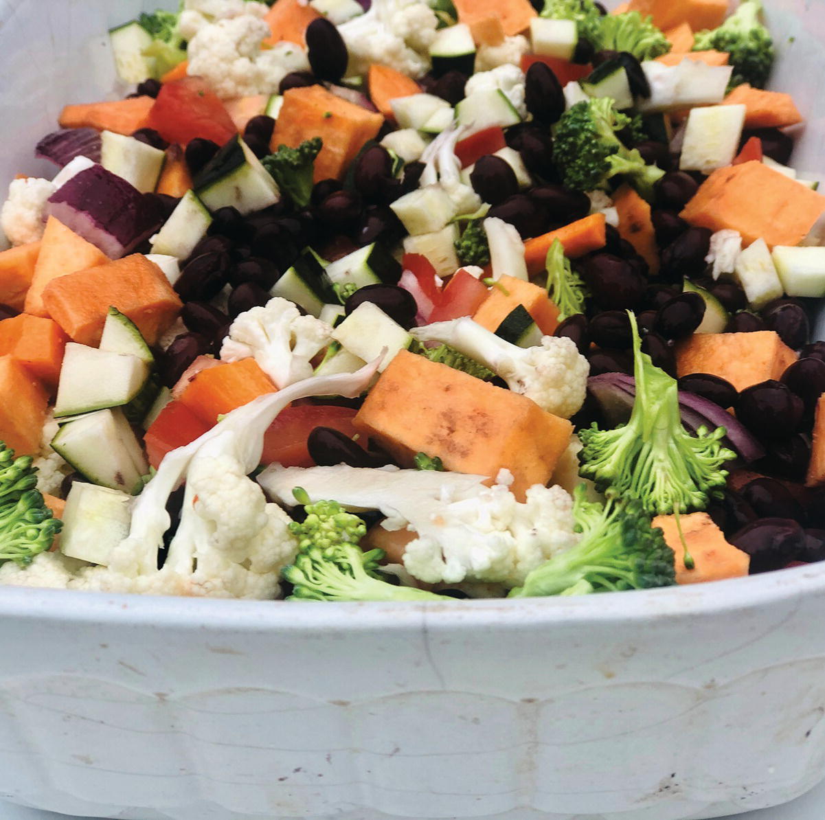 Photo displaying chunky vegetable tray bake.