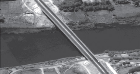 The Iraqi Remagen—A view of Objective Peach from the air. After the 1st Brigade took the bridge intact, the 2nd Brigade poured across to decimate the Medina Division.