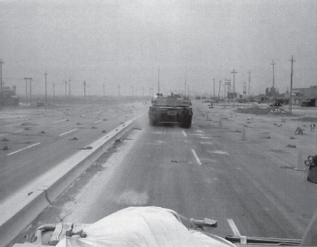 Just prior to the start of Thunder Run II, 3rd ID engineers, directly in front of Iraqi forward positions, cleared a tank lane through thousands of mines laid on the road surface.