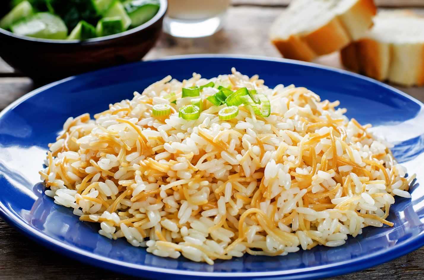 A blue and white rice on a plate Description automatically generated