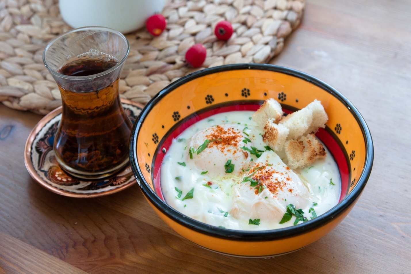 A bowl of food on a table Description automatically generated