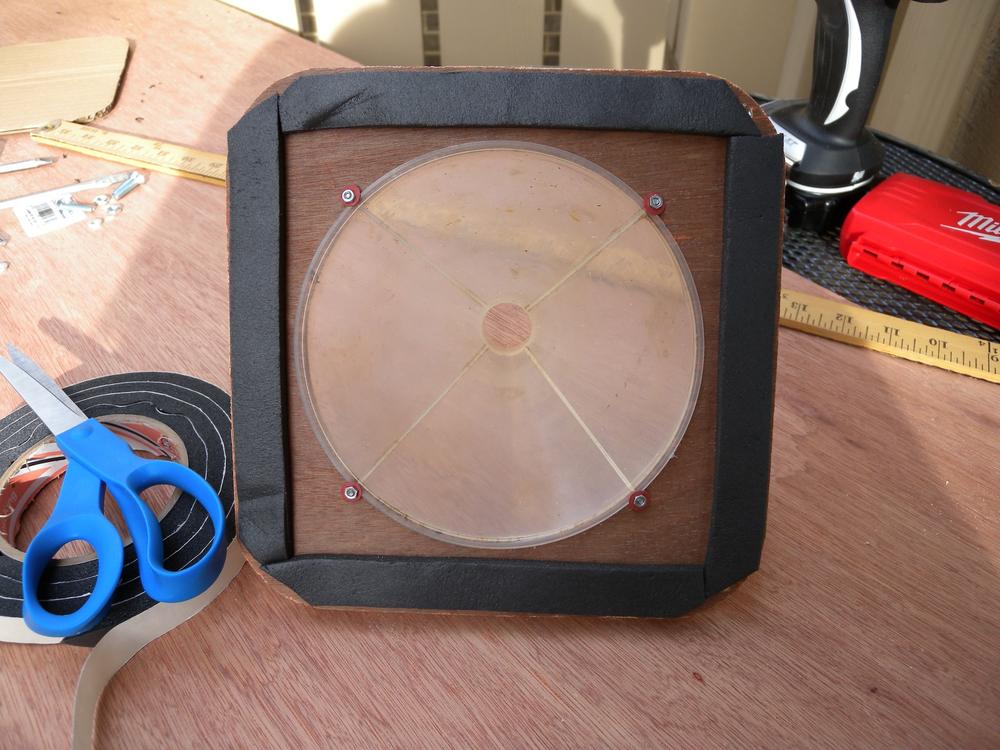 Attach foam tape to the back of the plywood plate to prevent any air leaks.