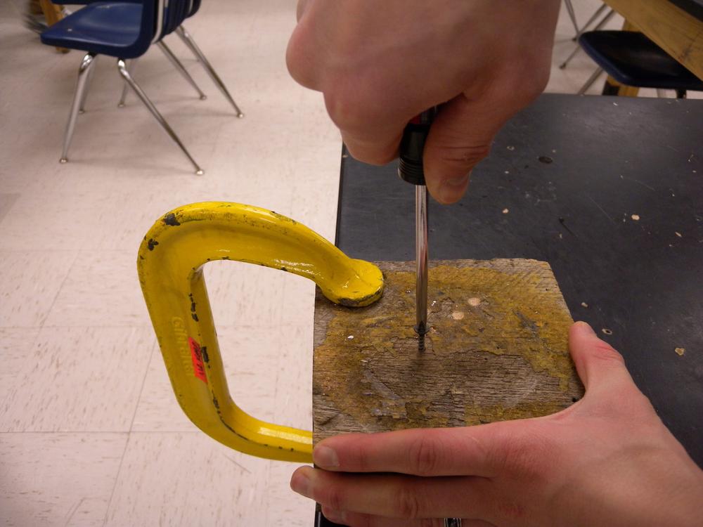 Apply downward pressure on the fastener when driving and removing fasteners with a screwdriver.