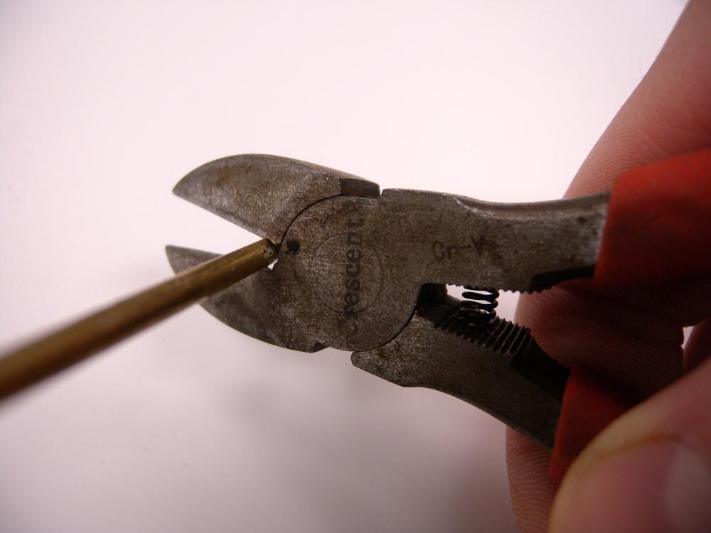 Wire snips produce more cutting power at the root of their jaws.