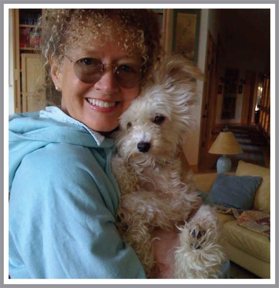 Photograph of Mary Pope Osborne with one of her dogs