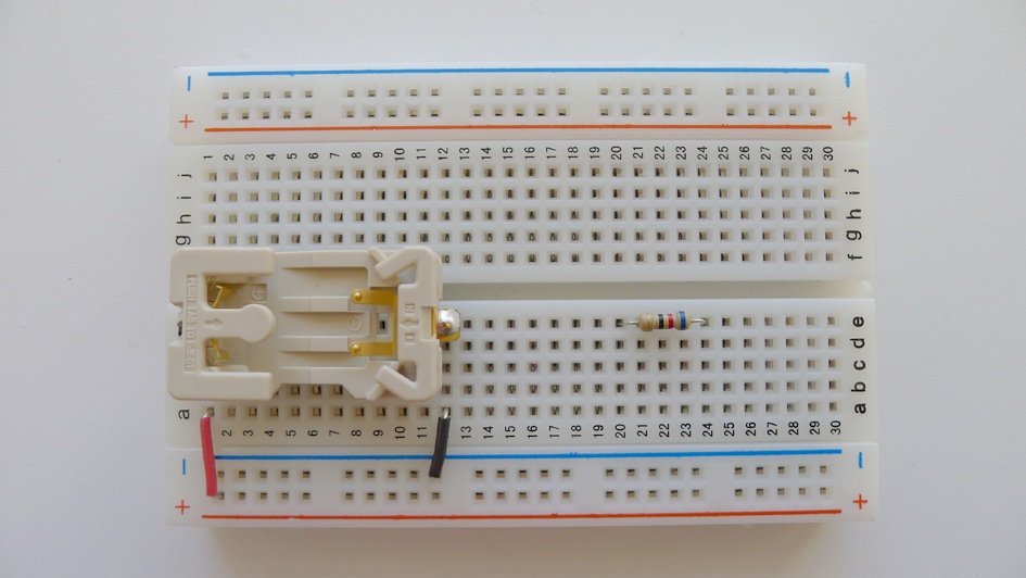 Adding the resistor to the breadboard