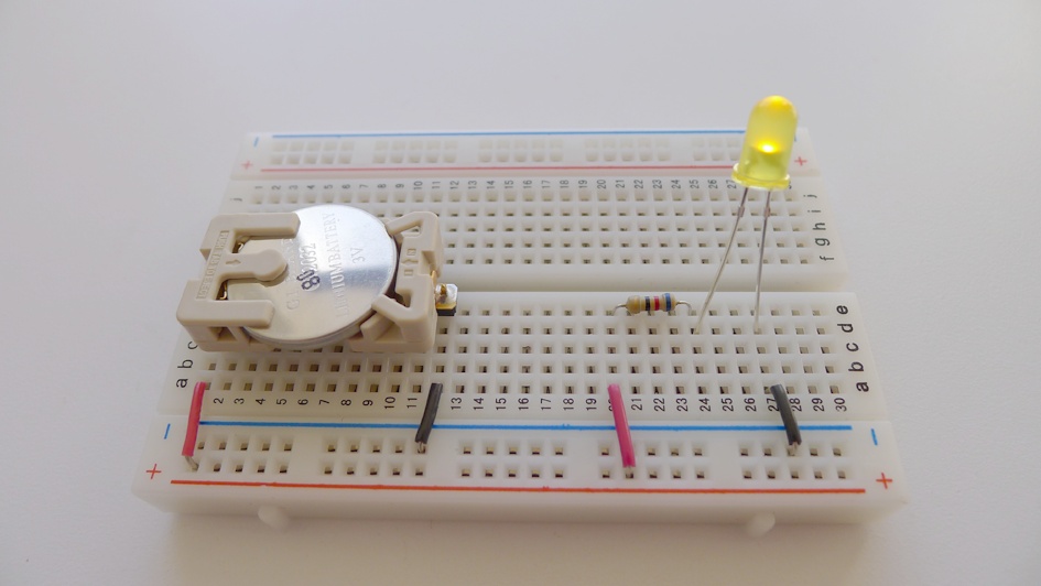 Breadboard circuit with LED lit