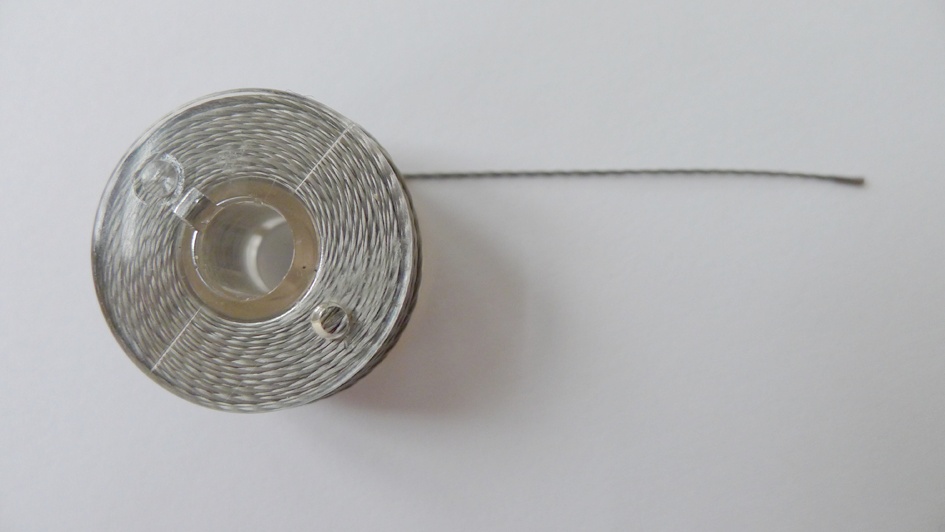 Bobbin of conductive thread