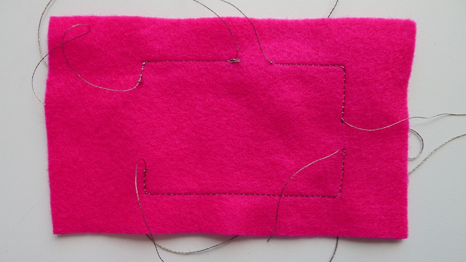 Conductive thread traces created with a sewing machine