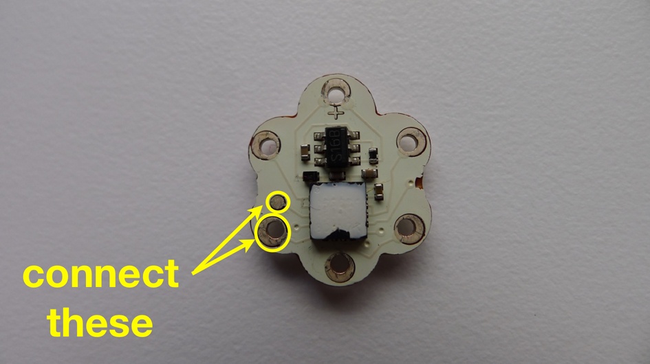 Resetting Aniomagic—use a pair of tweezers to bridge these two connections