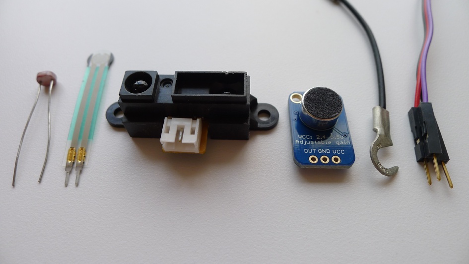 Sensors with different connectors; left to right: legs, terminals, JST connector, pins, hook, male headers