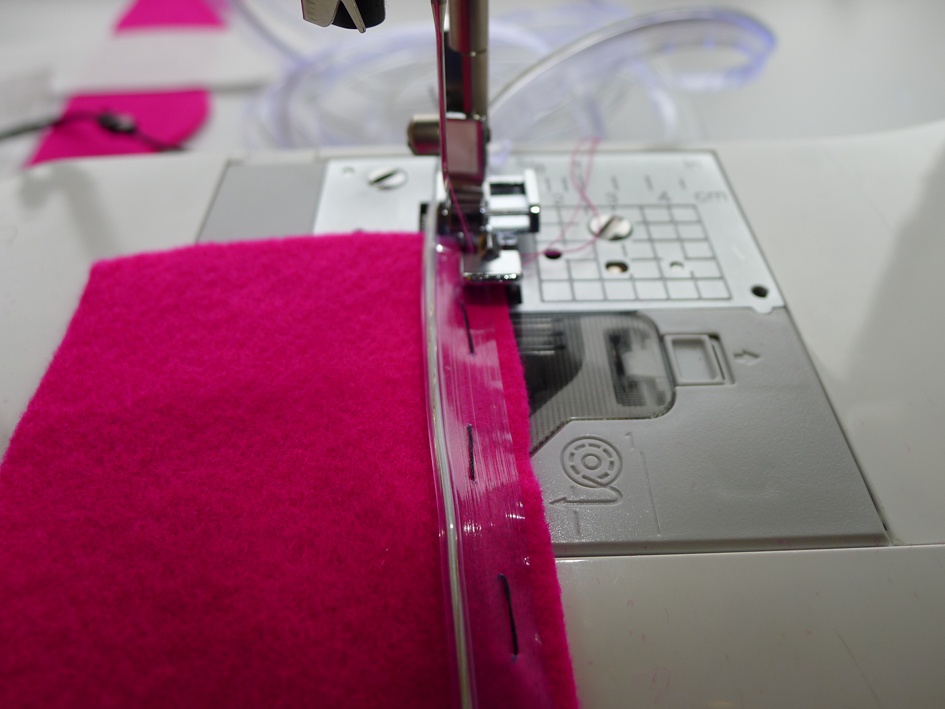 Sewing down EL wire with a sewing machine