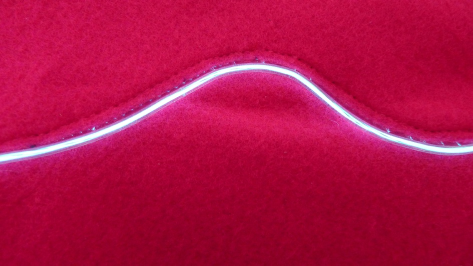 EL wire incorporated into a seam