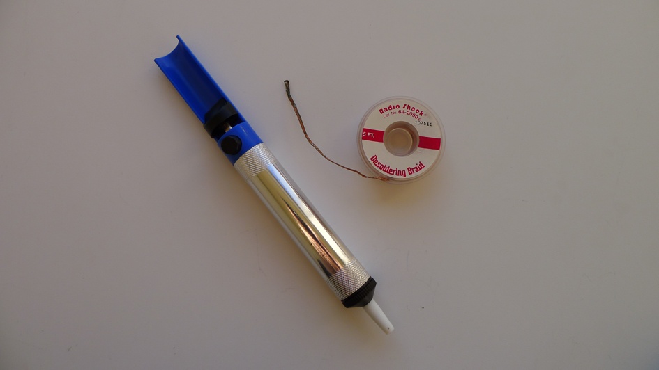 A solder sucker and solder wick