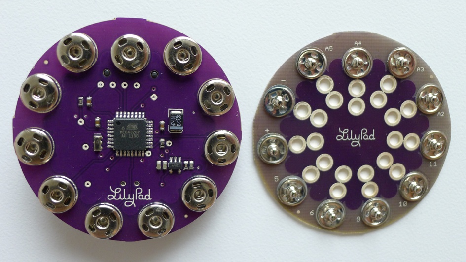 LilyPad Arduino SimpleSnap (back) and LilyPad SimpleSnap Protoboard (front)