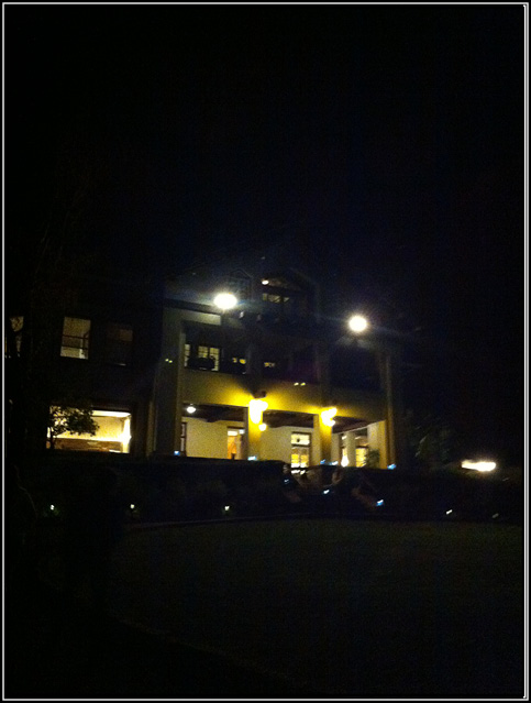 Picture of the Mansion at night.