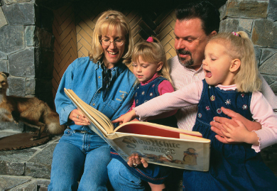 Thomas Kinkade with Nanette and their daughters.