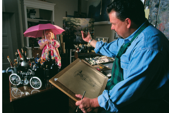 Kinkade in his studio with daughter, Winsor...