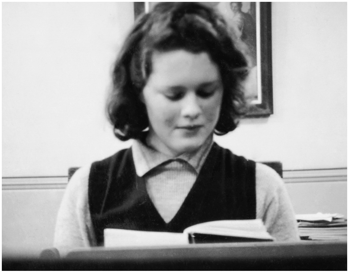 At school, age fifteen: the bookworm. 