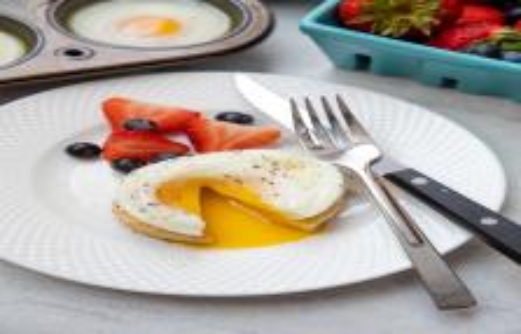 Poached Egg on Piece of toast with yolk running out