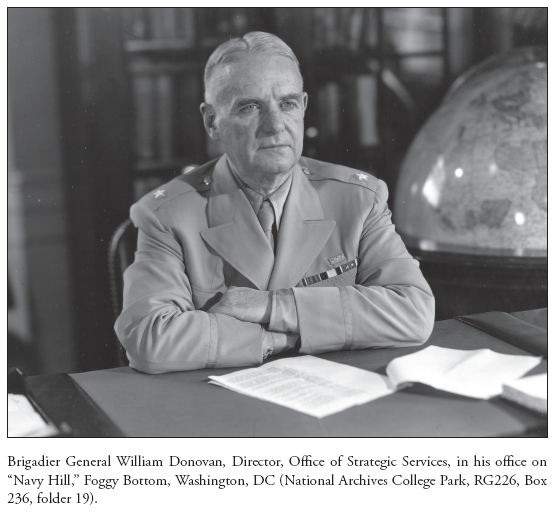 Image: Brigadier General William Donovan, Director, Office of Strategic Services, in his office on “Navy Hill,” Foggy Bottom, Washington, DC (National Archives College Park, RG226, Box 236, folder 19).