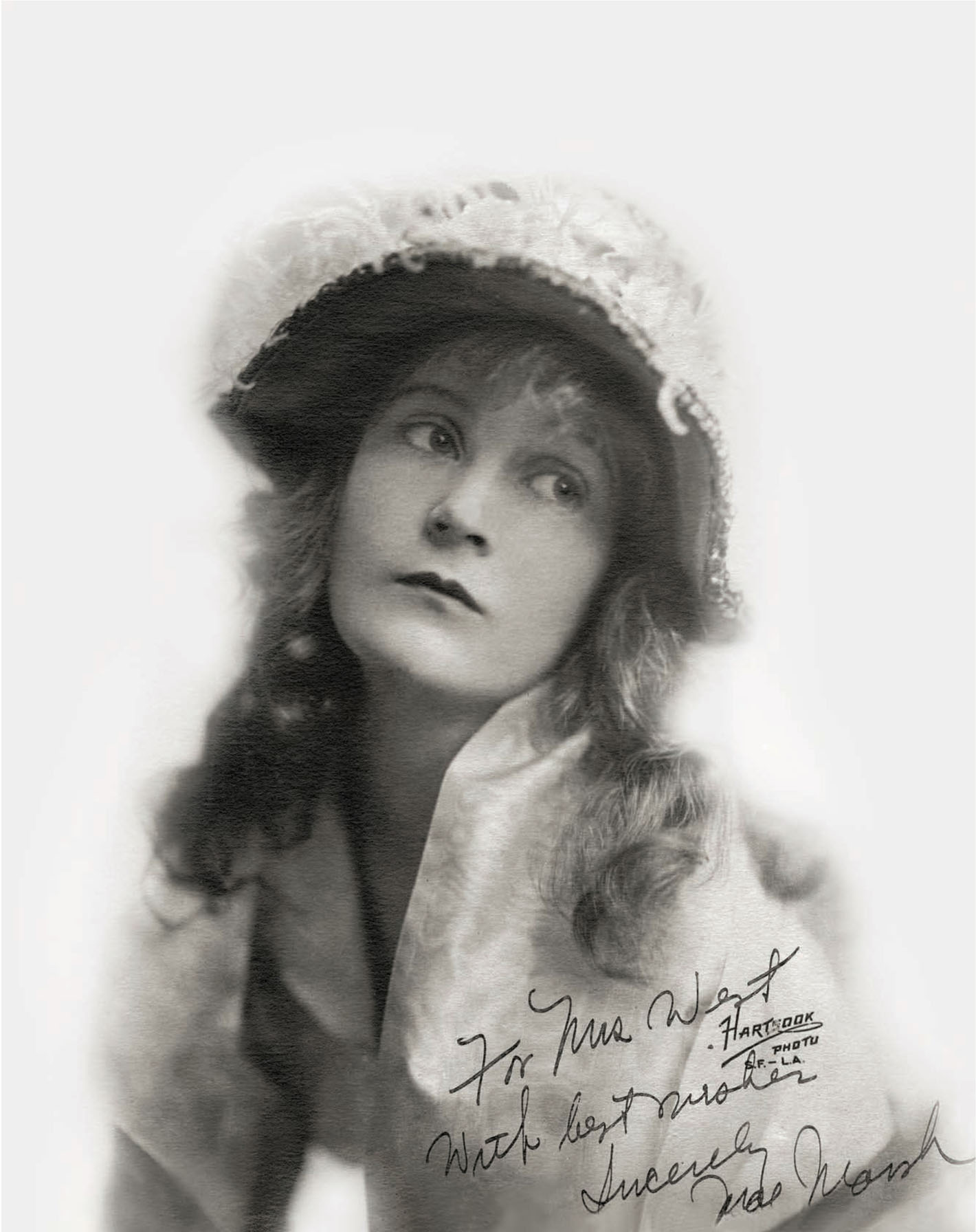 Mae Marsh inscribed this photo of herself in costume for The Birth of a Nation (1915) to Clare West.