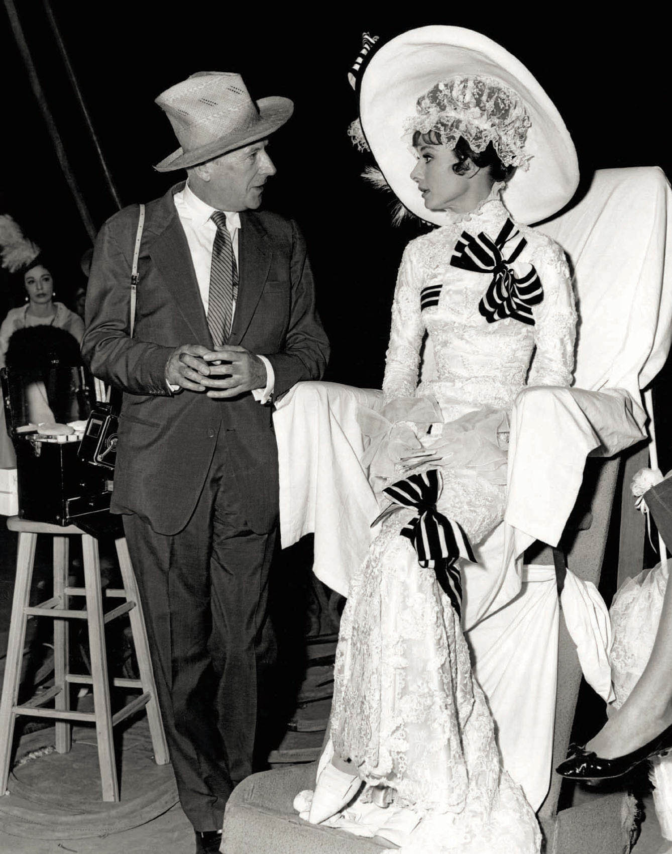 Cecil Beaton and Audrey Hepburn on the set of My Fair Lady (1964).