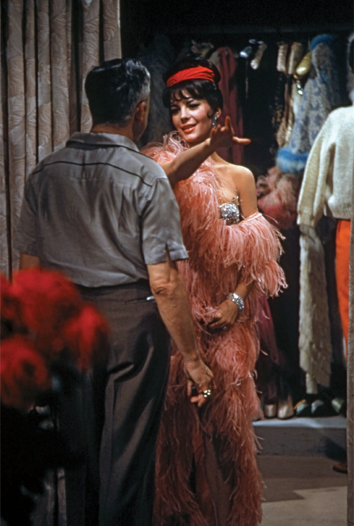 Orry-Kelly confers with Natalie Wood during a fitting for Gypsy (1962).