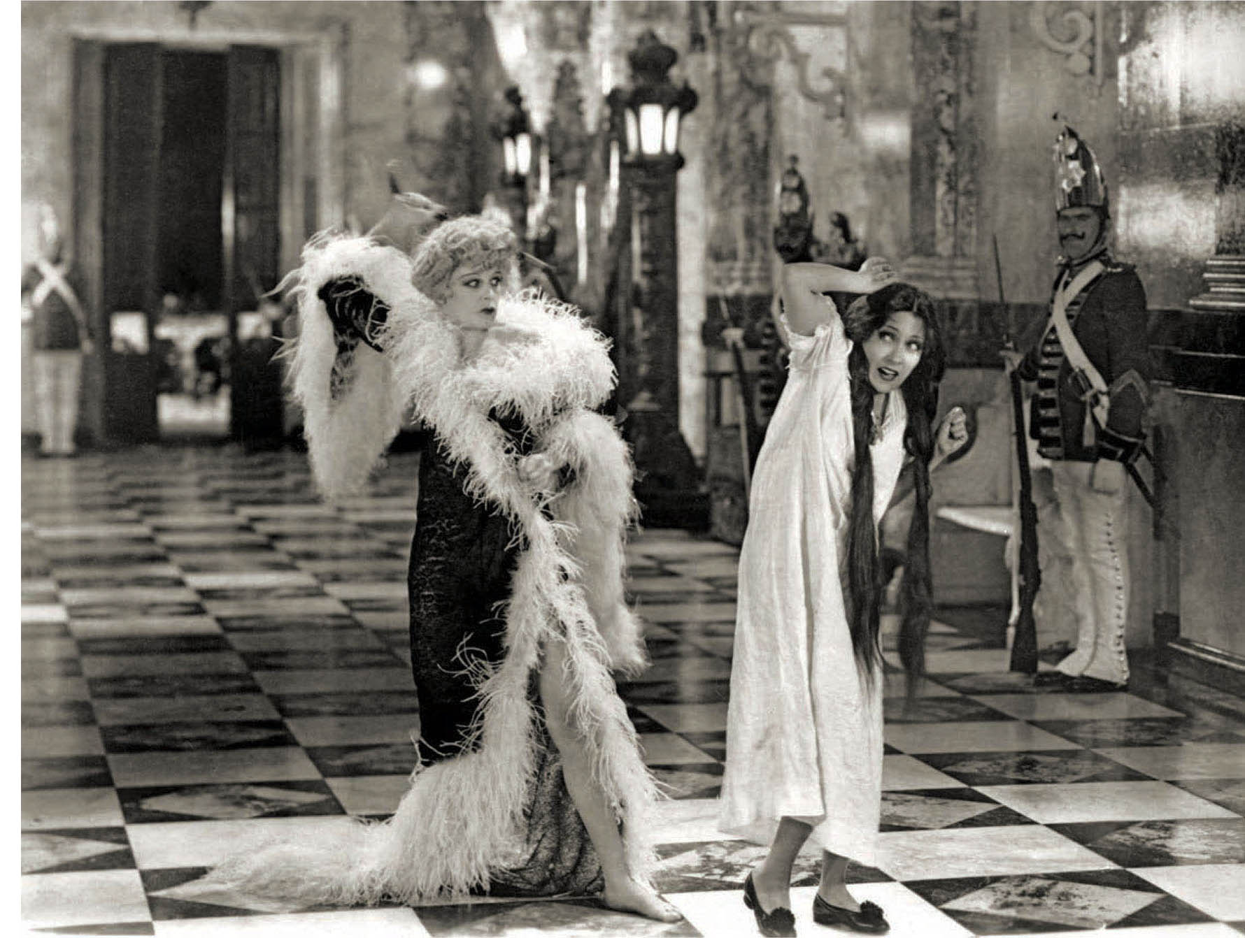 Seena Owen whips Gloria Swanson in Queen Kelly (1929).