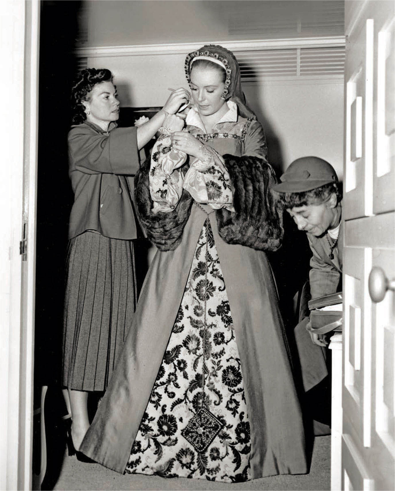 Deborah Kerr (center) is readied for a scene in Young Bess (1953).