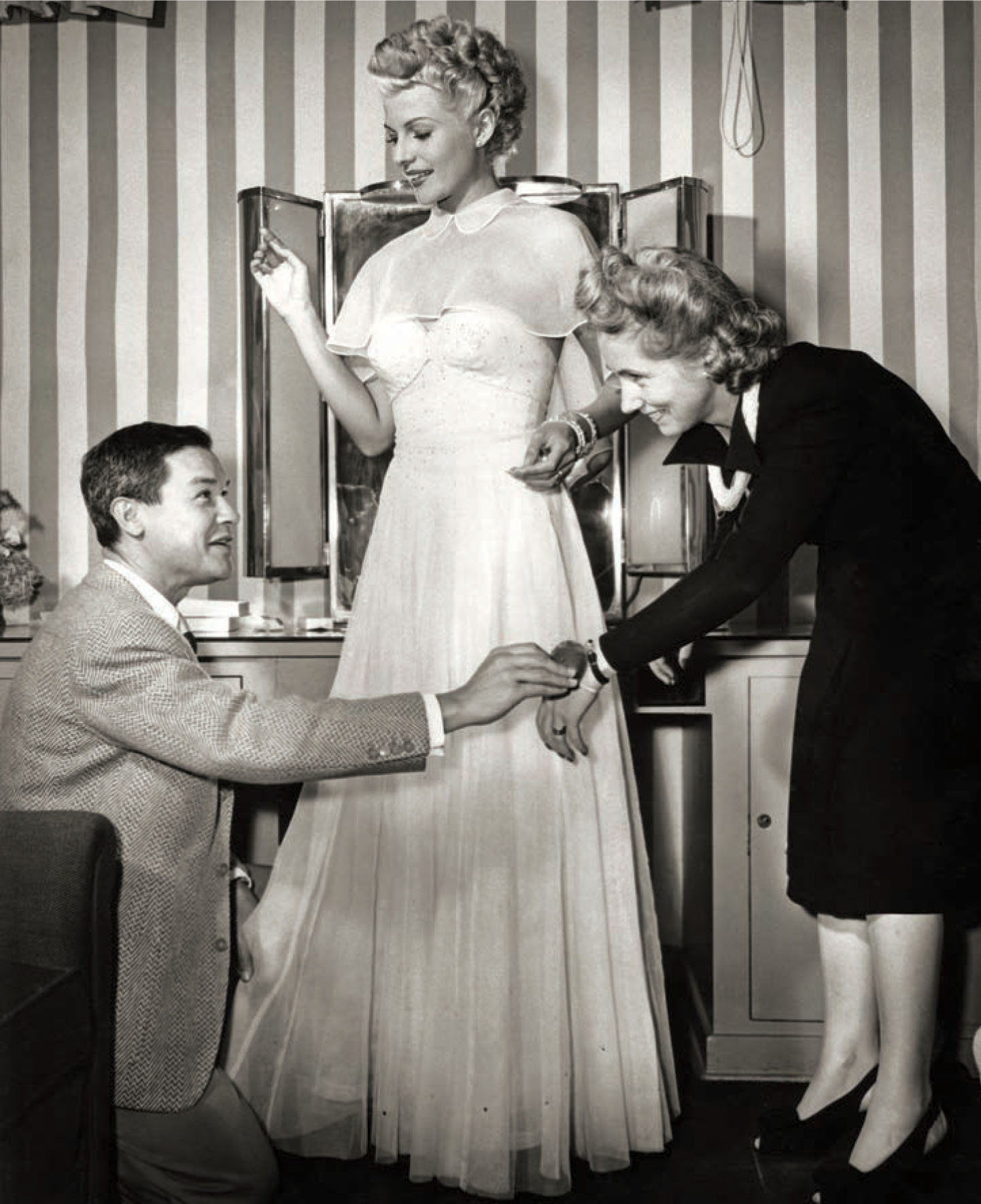 Jean Louis (left) and Elizabeth Courtney fit Rita Hayworth for The Lady from Shanghai (1947).