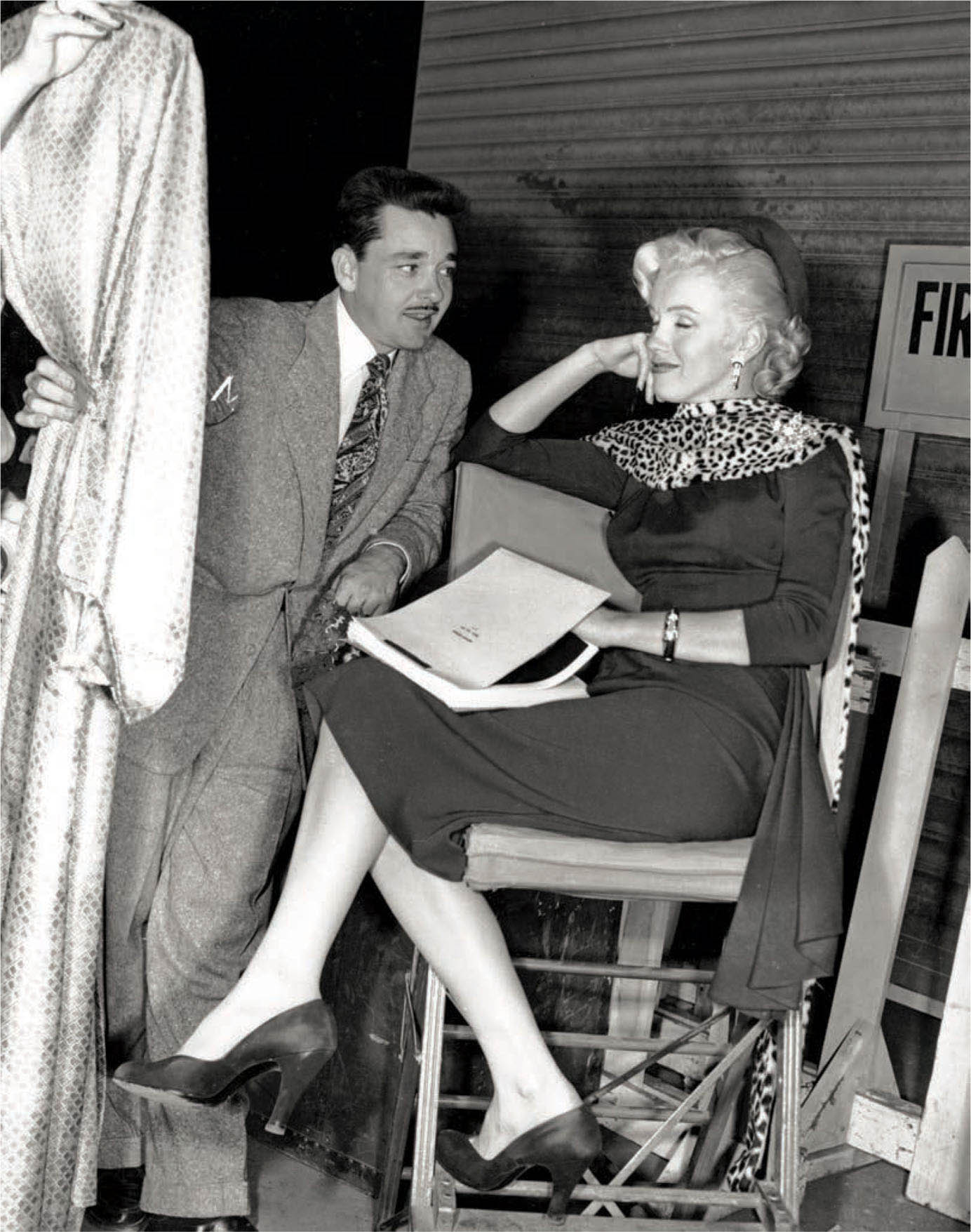 William Travilla and Marilyn Monroe on the set of Gentlemen Prefer Blondes (1953).