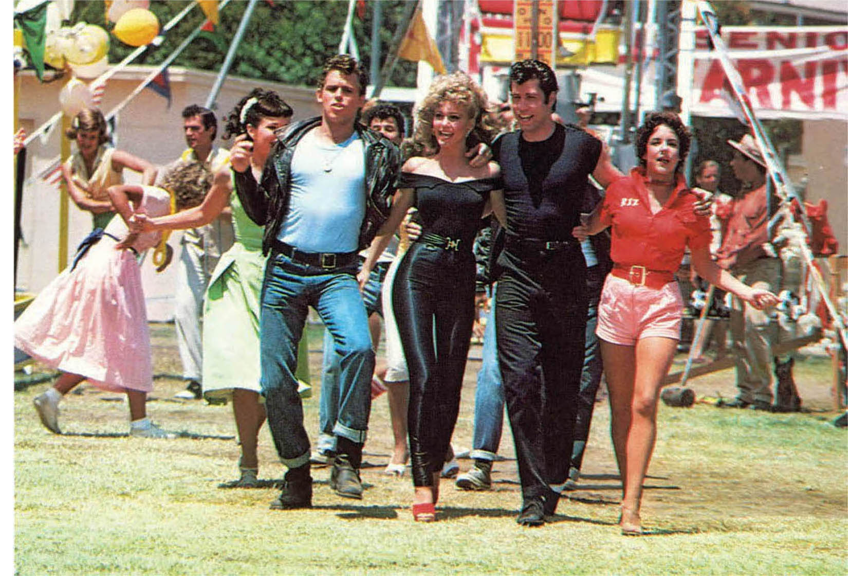 Jeff Conaway, Olivia Newton-John, John Travolta, and Stockard Channing in Grease (1978).