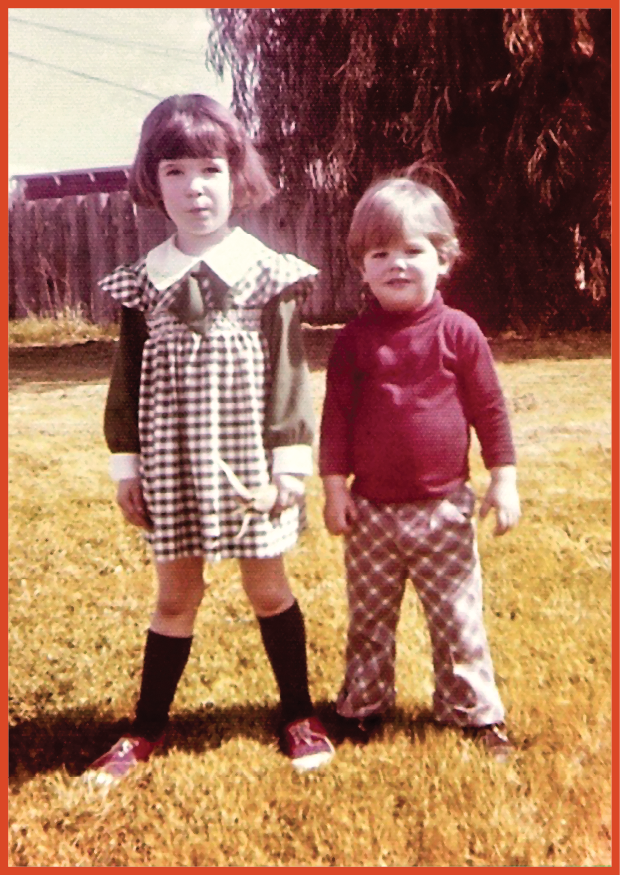 image of a boy and girl standing together outside