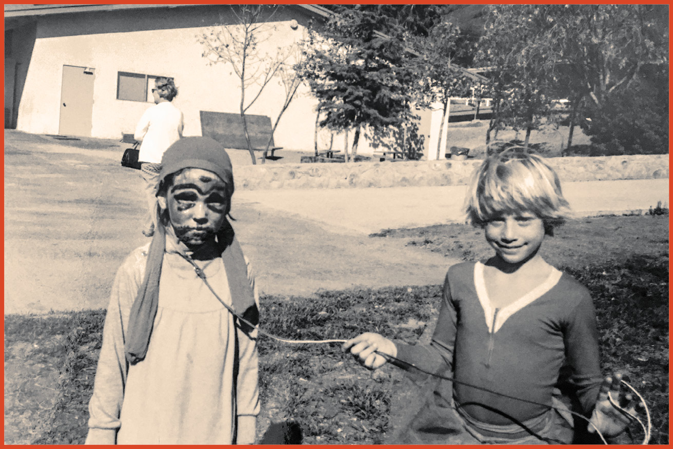 image of a boy and girl dressed up for Halloween