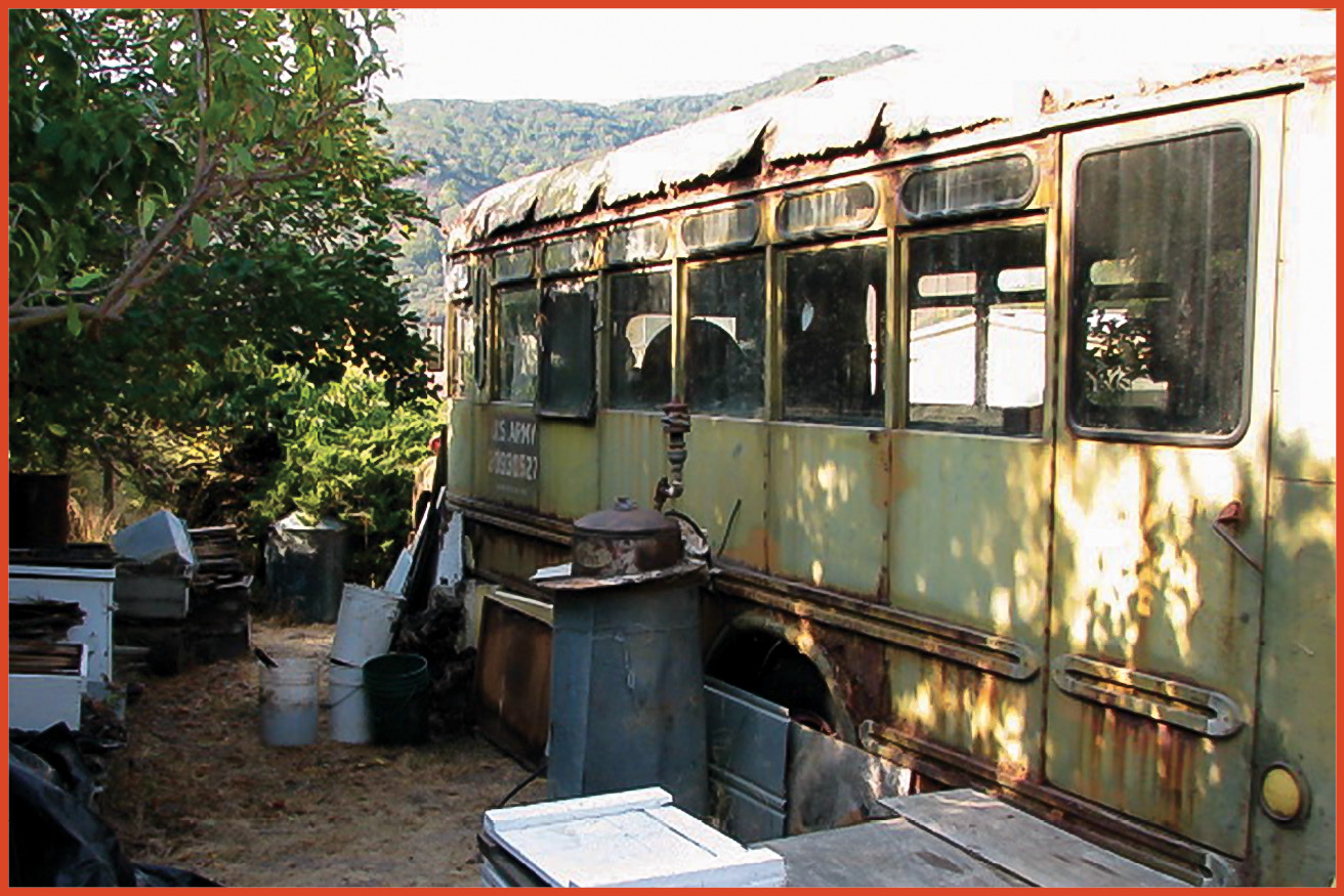 image of side view of ruined bus