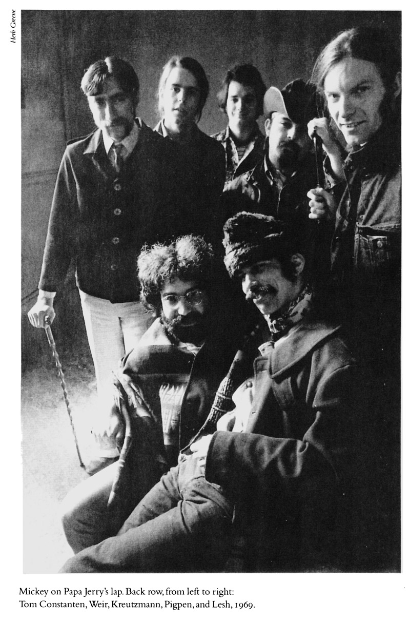 Mickey on Papa Jerry’s lap. Back row, from left to right: Tom Constanten, Weir, Kreutzmann, Pigpen, and Lesh, 1969.