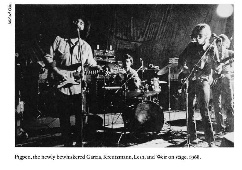 Pigpen, the newly bewhiskered Garcia, Kreutzmann, Lesh, and Weir on stage, 1968.