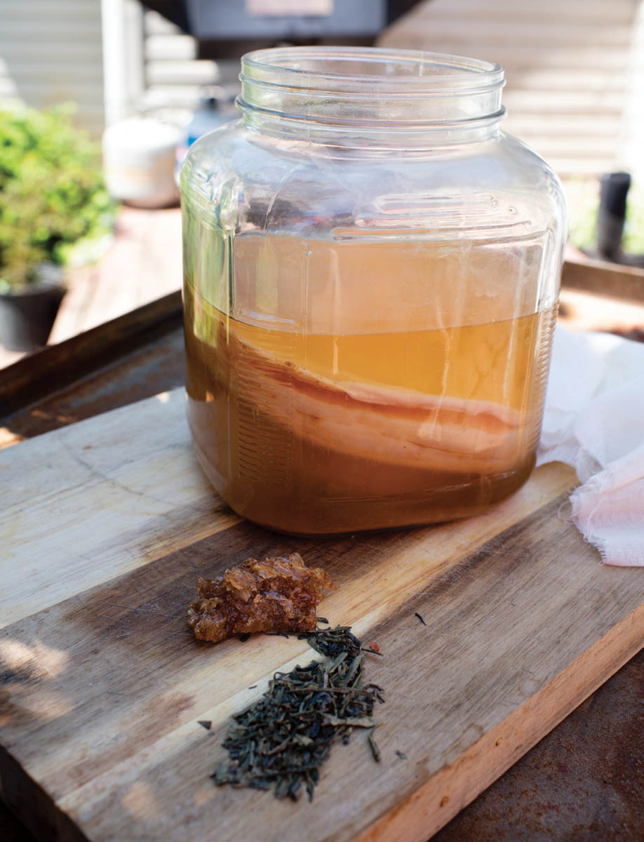 A jar of herbal honey kombucha.