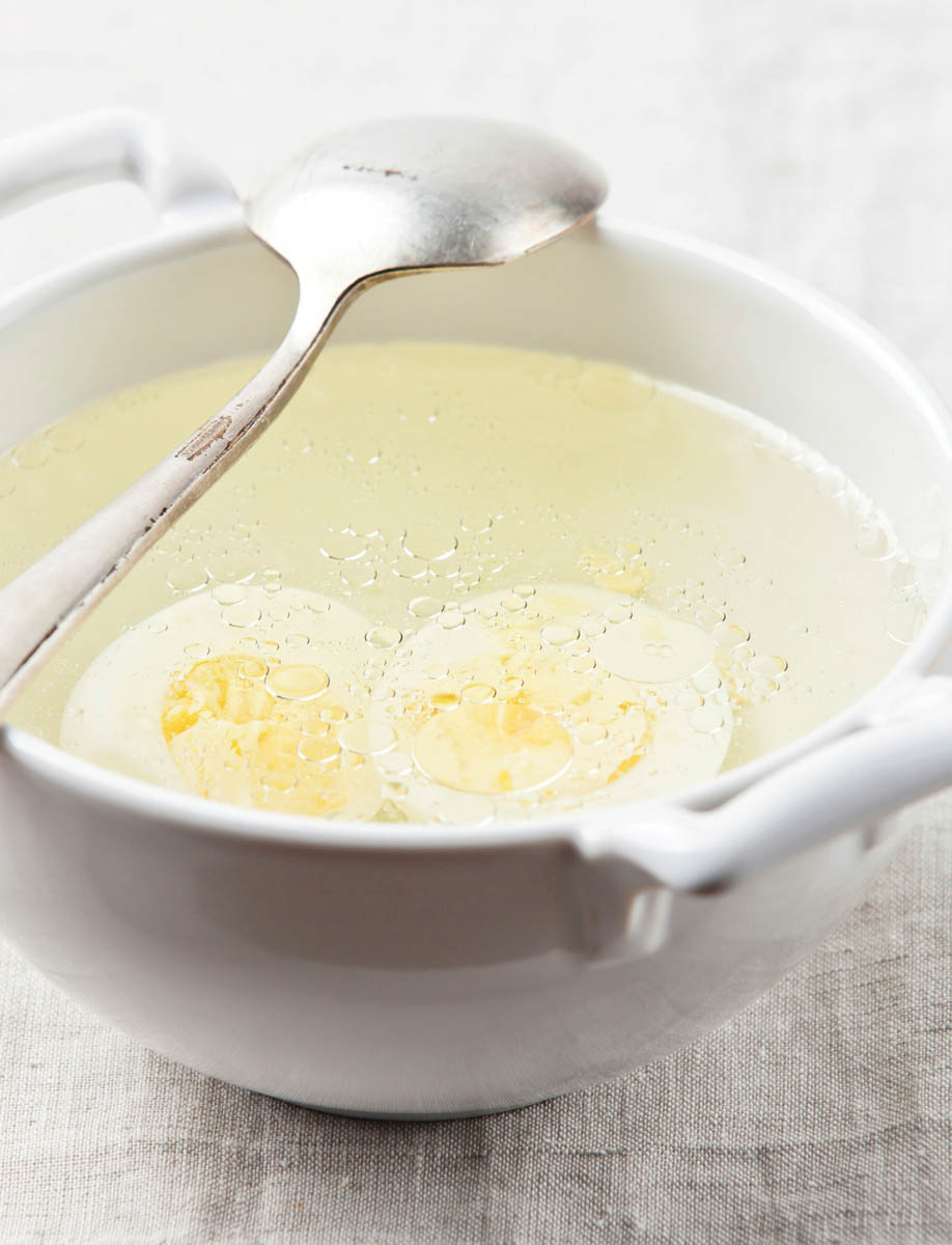 A bowl of sweet and sour soup base honey spread.