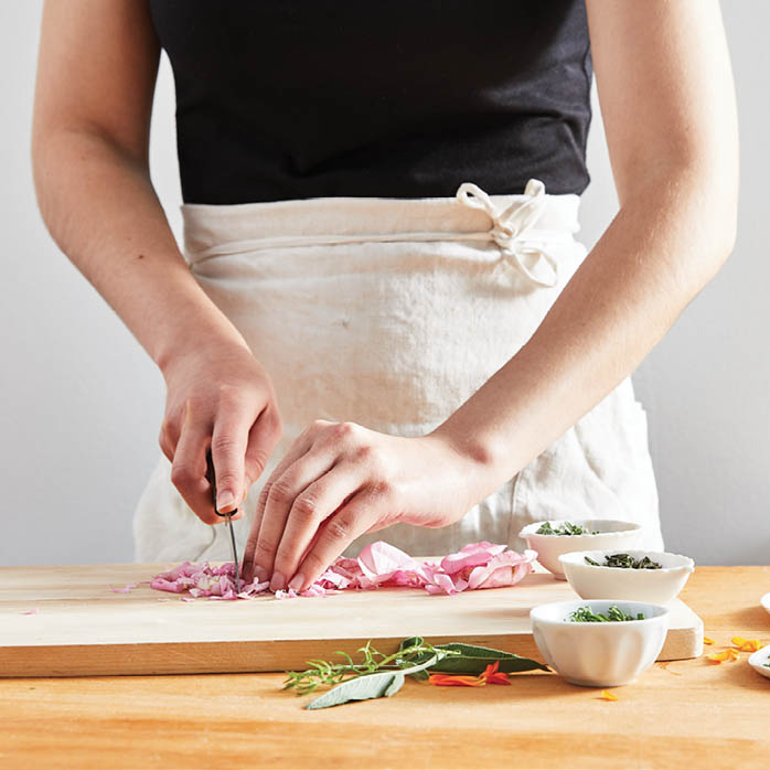 Chopping flower petals.