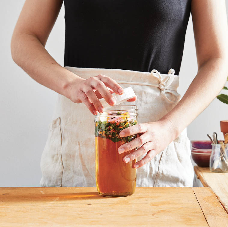 Sealing the jar of mixed ingredients.