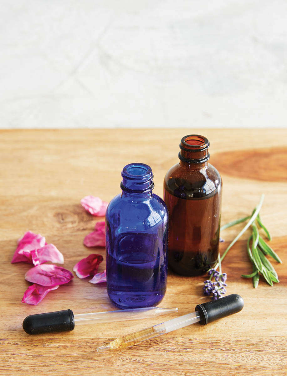 Small tincture jars and eyedroppers.