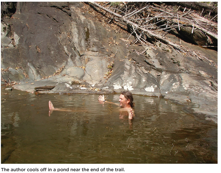 The author cools off in a pond near the end of the trail.